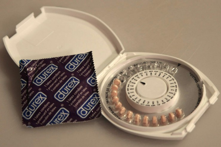 Condom And Packet Of Birth Control Pills Society For Menstrual Cycle Research 4021