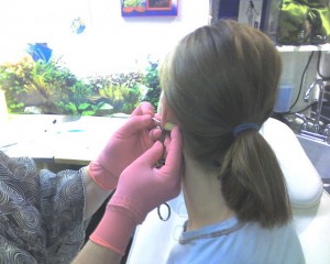 Getting her ears pierced